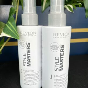 Two bottles of Style Masters Lissaver Heat Protection Spray 150ml are displayed on a black surface, with green and white leafy plants in the background.