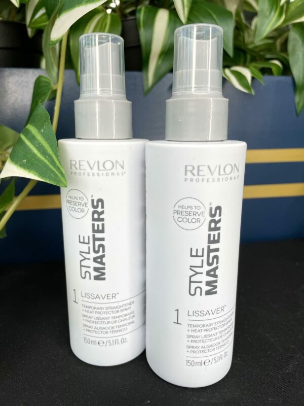 Two bottles of Style Masters Lissaver Heat Protection Spray 150ml are displayed on a black surface, with green and white leafy plants in the background. Two bottles of Style Masters Lissaver Heat Protection Spray 150ml are displayed on a black surface, with green and white leafy plants in the background.