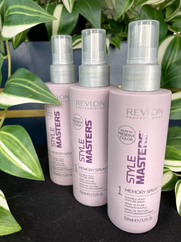 Three bottles of Style Masters Memory Spray 150ml are displayed in front of vibrant green-striped plants. Three bottles of Style Masters Memory Spray 150ml are displayed in front of vibrant green-striped plants.